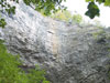 Close up cliff above tunnel.