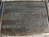 Plaque on scenic view above city.