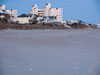 Building by beach.