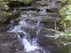 View of the falls by the road.