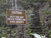 The warning sign to the stairs.